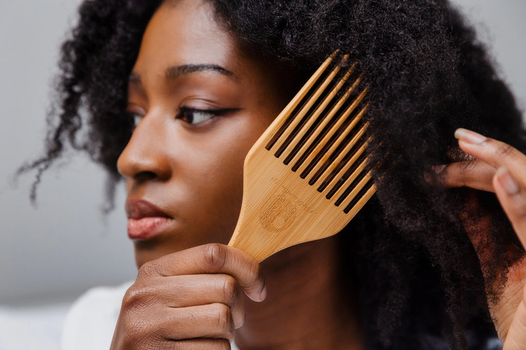 Eco-friendly bamboo comb reducing breakage and promoting natural oil distribution